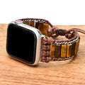 Rectangular tiger eye stone chain on a brown adjustable textile watch strap for men.