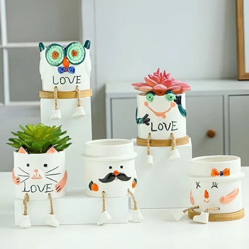 Ceramic hanging foot flowerpot in a cartoon style for desktop succulents.