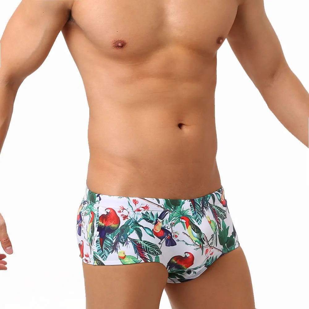 Men's floral print nylon swimming trunks with a cup cover, shown in the 619 flowers and birds colour pattern.