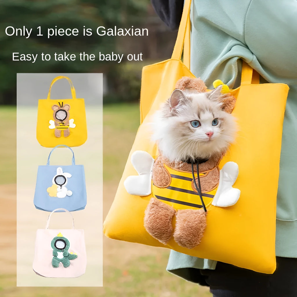Little Bee Design canvas pet carrier shoulder bag with safety zippers and an adjustable elastic head opening for a cat or small dog.