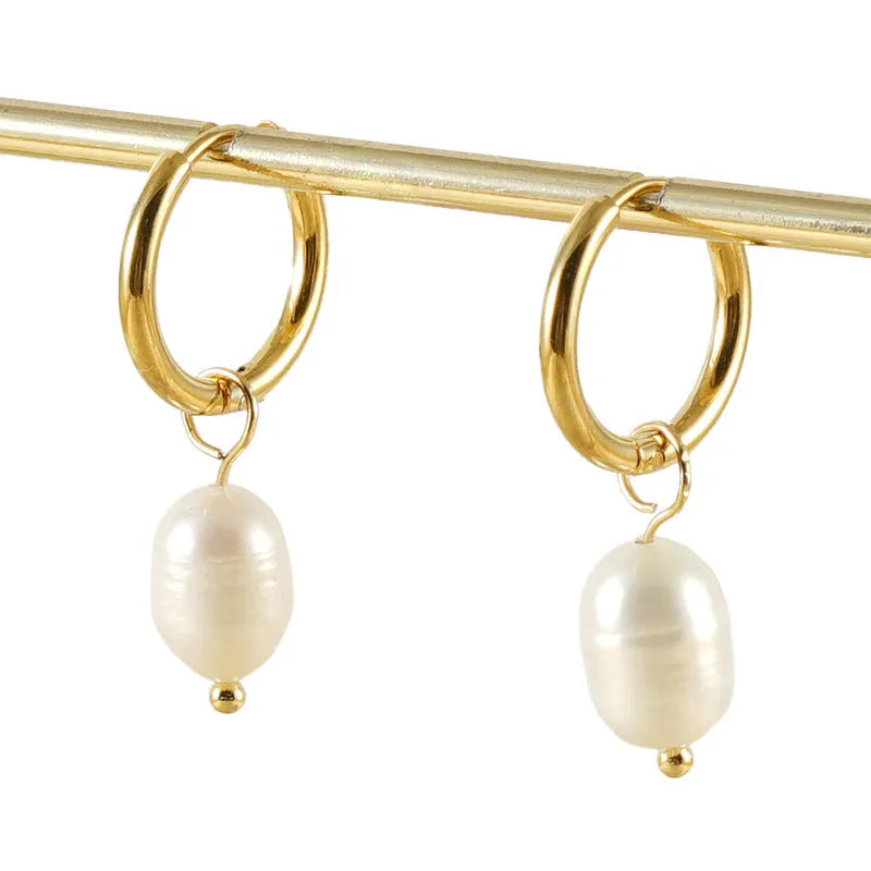 Gold coloured stainless steel geometry earrings with pearl decorative elements for women