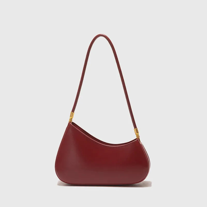 Women's oval retro underarm handbag in PU leather, shown in one of seven colours with a single strap and sewing line detail.