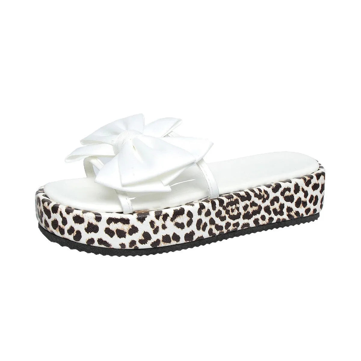 Leopard print women's slippers with thick sole and round toe in black or white.
