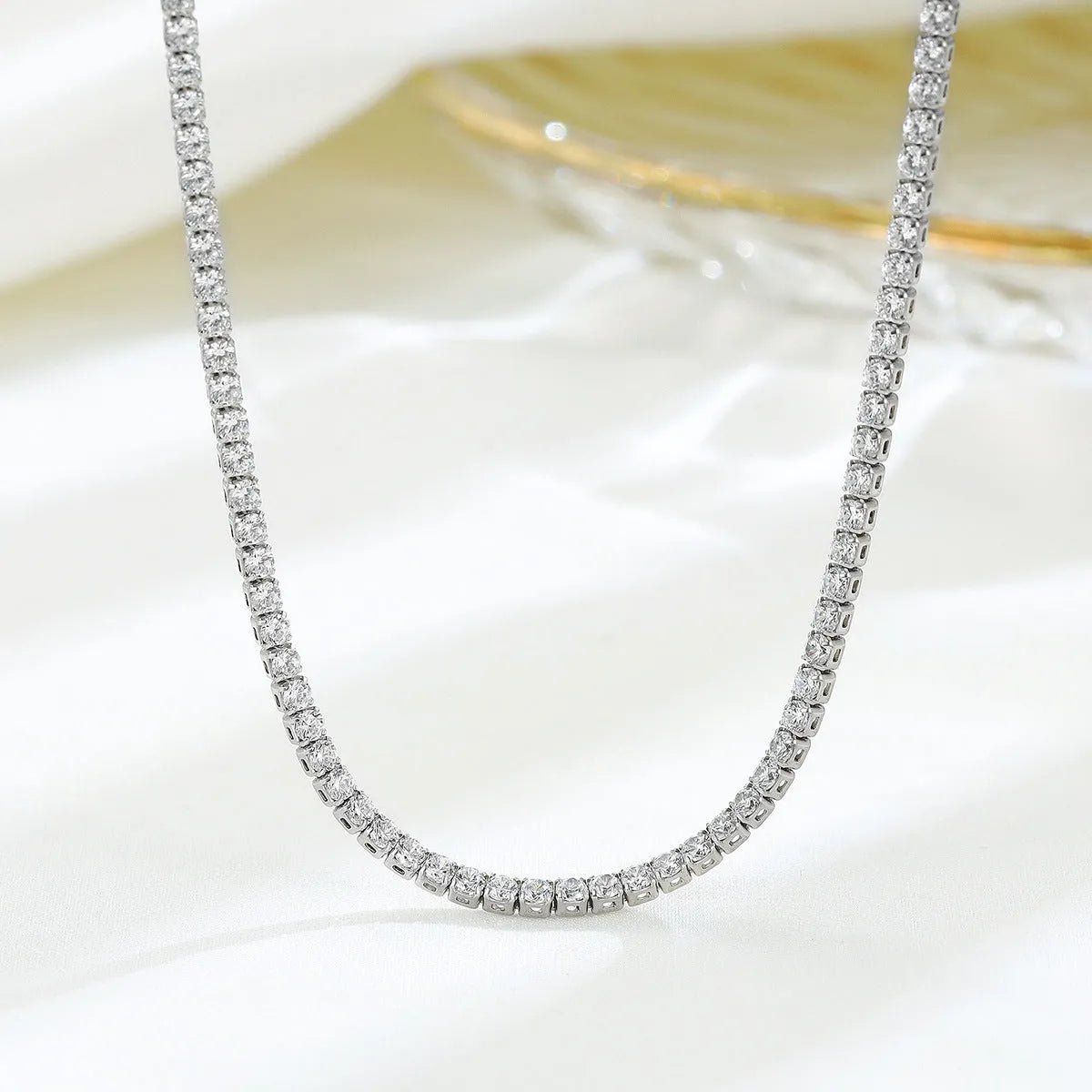 Women's sterling silver necklace with round elements and diamond treatment