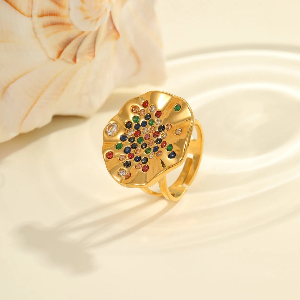 Geometric pleated stainless steel ring with open mouth adjustable design and inlaid coloured crystals