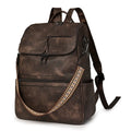 Solid colour retro college backpack with curved shoulder straps, shown in multiple colour options including black and blue.