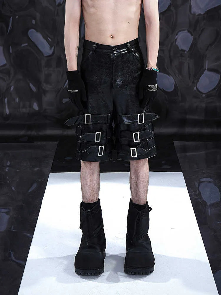 Men's black PU leather shorts with ring detailing, cropped casual design
