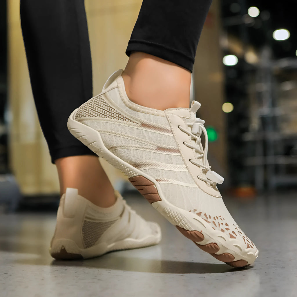 Casual unisex beach running shoes with Lycra stretch fabric upper, shown in beige colour.