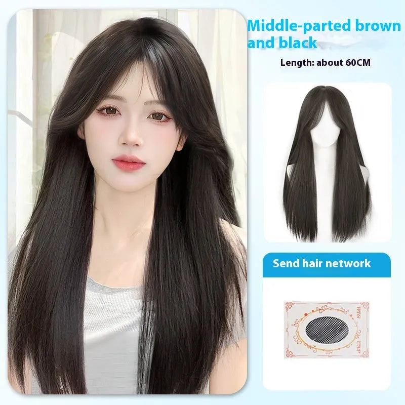 Long straight synthetic wig on a stand, shown in black colour with a full fringe.
