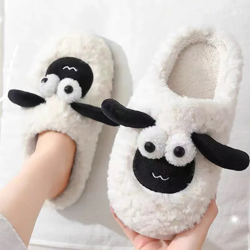 Brown thermal cotton slip-on slippers with a suede upper and a light-coloured PVC sole.