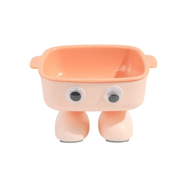 Green robot-shaped elevated cat bowl with tilted food dish and non-slip base.