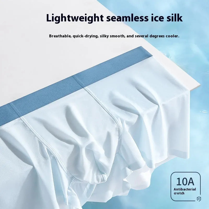 Men's ice silk graphene antibacterial shorts in light blue shown flat, highlighting seamless knit and mid-waist design.