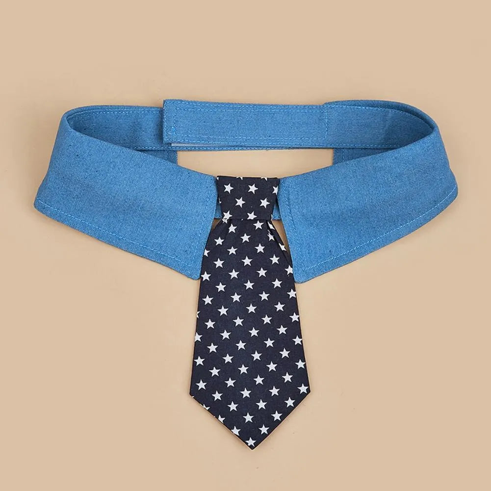 Blue denim adjustable dog collar with a black bow tie featuring white star patterns.