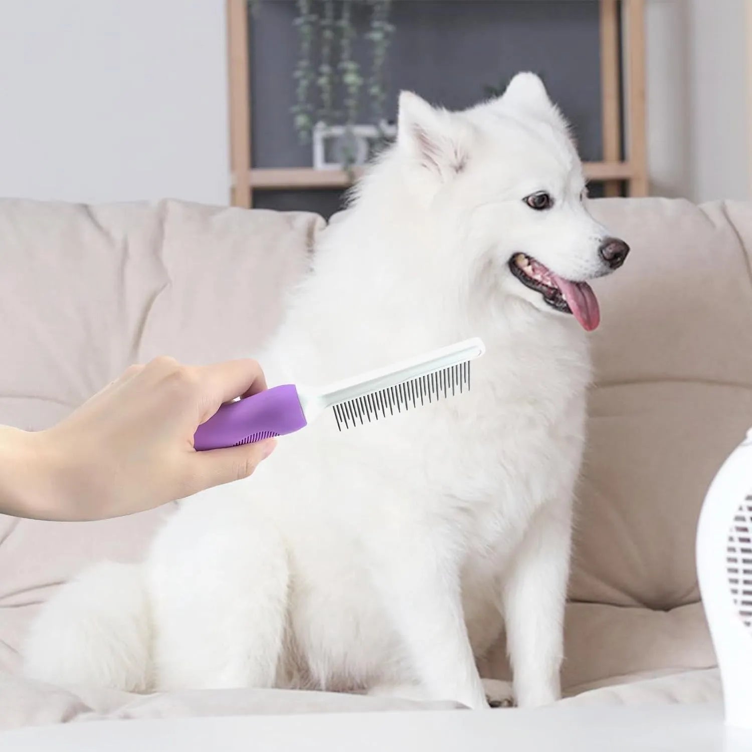 Purple pet grooming comb with stainless steel teeth and ergonomic handle for dog and cat coat detangling