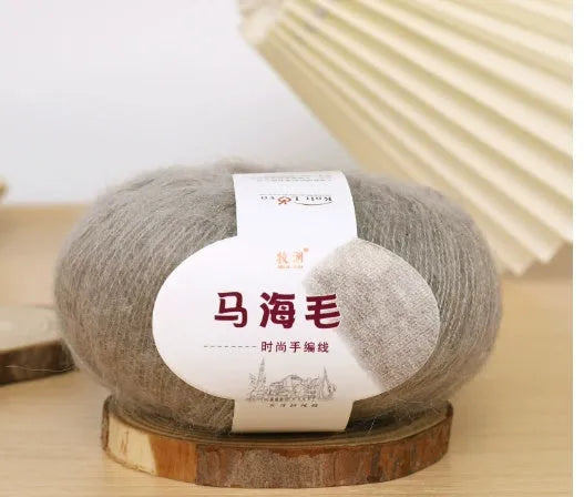 Mohair wool ball for DIY scarf knitting in assorted colours on white background