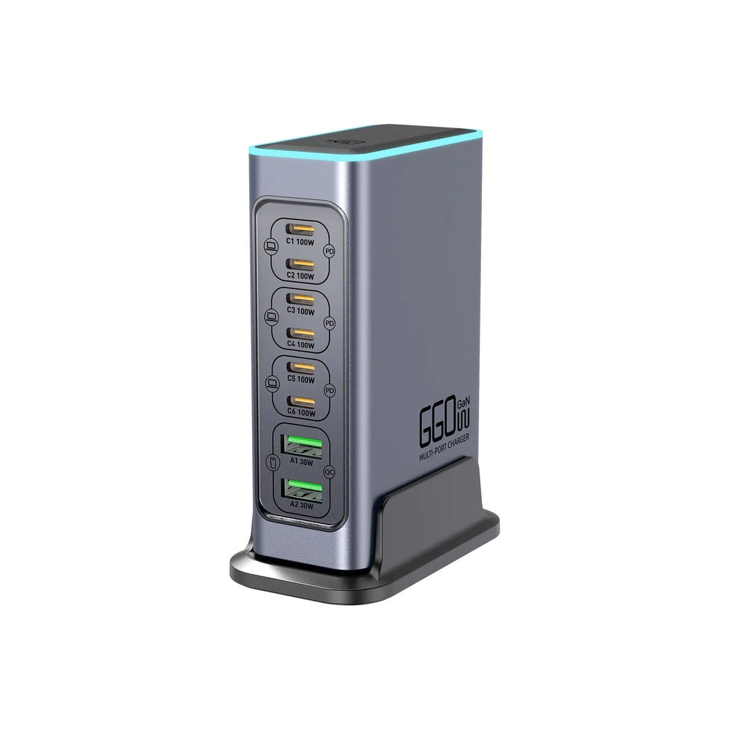 660W Gallium Nitride fast charger with US, EU, UK, and AU plug adapters for laptops and phones.