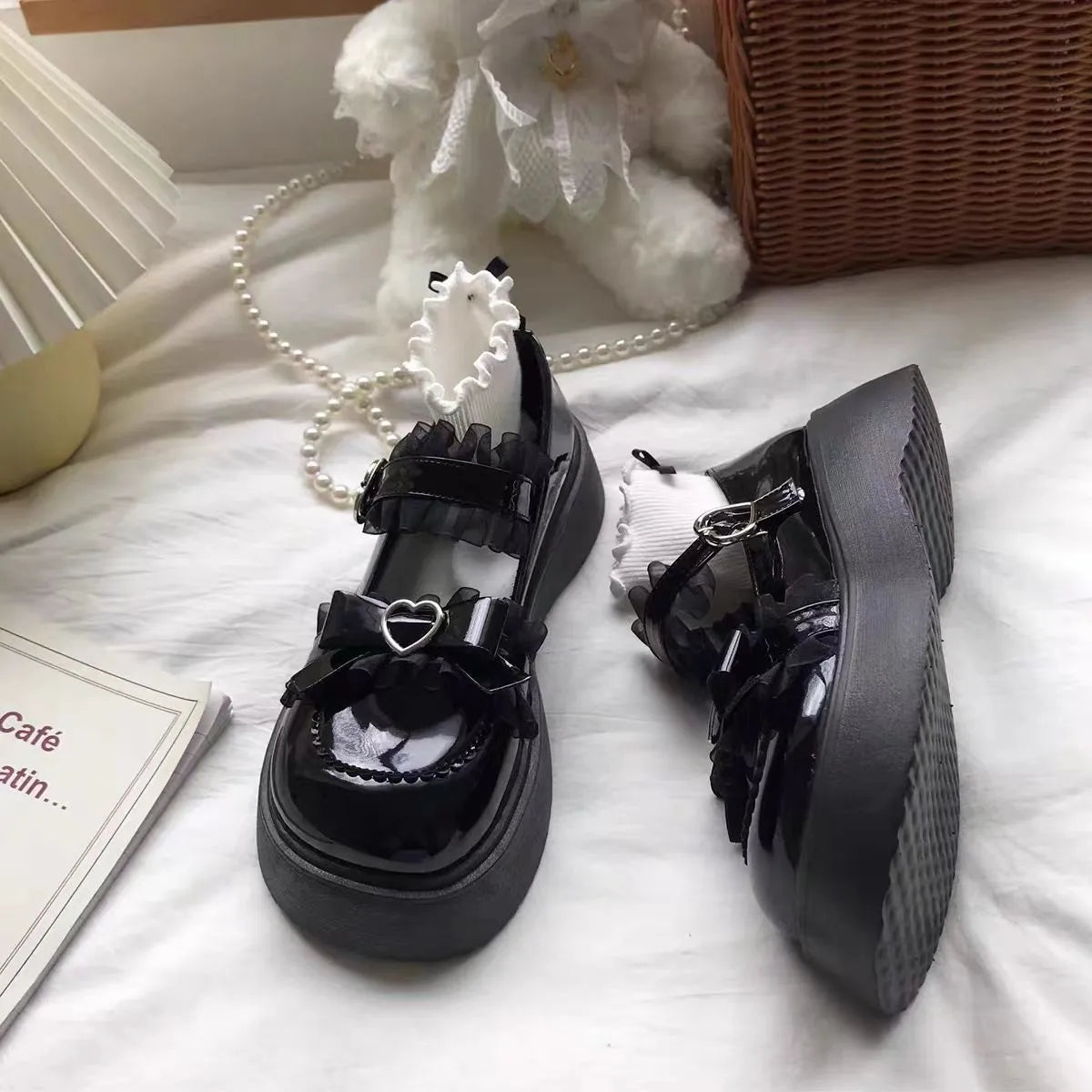 Mary Jane platform shoes for women with wedge heel on a plain background