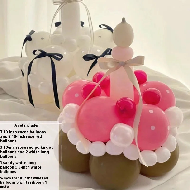 Finished round balloon bouquet decoration for cake table centrepiece.