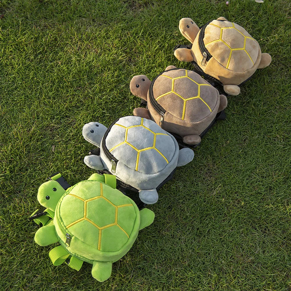 Turtle-shaped dog backpack harness in velvet with metal zipper, shown in available colours