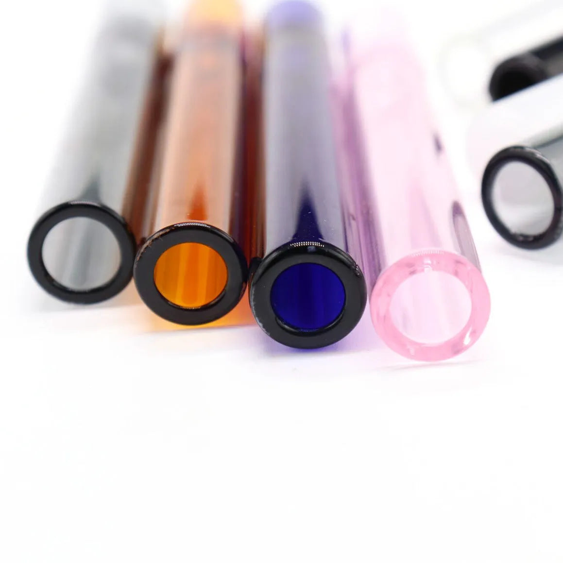 Clear glass telescopic smoking pipe with straight tube and suction nozzle.