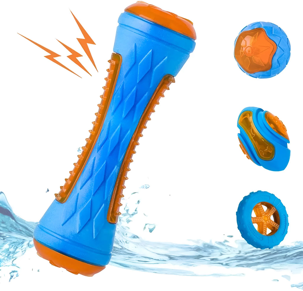 Set of three TPR dog toys: a blue squeaky ball, an orange barbell, and red tyres on grass.