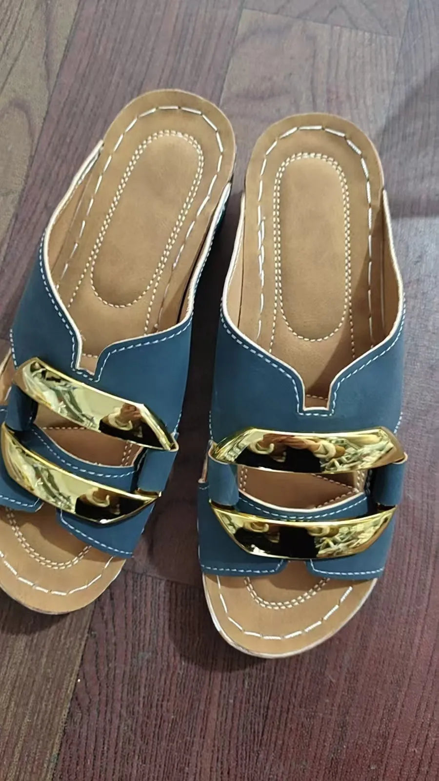 Roman style platform sandals in white, black, khaki, and sea blue on a solid background