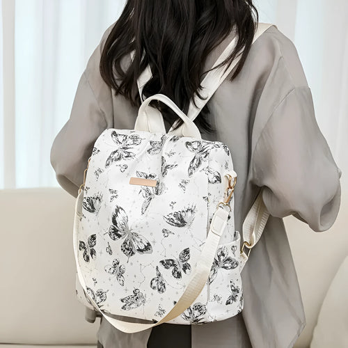 Butterfly printed PU backpack in multiple colours showing sewing line detail and curved backplate