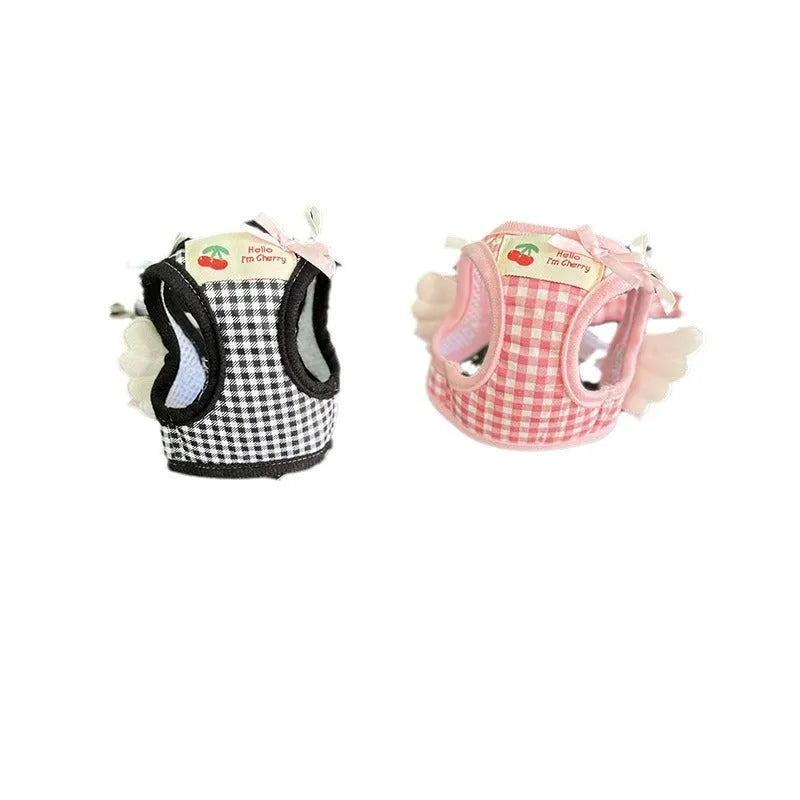 Pink cotton chest-back dog harness with a top handle for a small dog.
