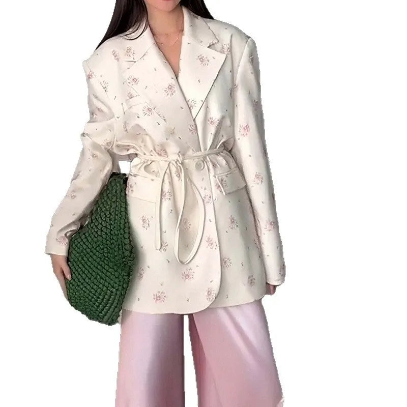 Women's suit jacket with collar and lace-up waist detail in polyester fabric