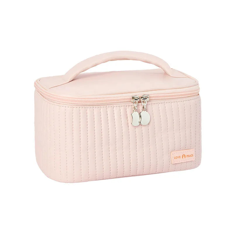 Open-top PU leather makeup bag in a choice of six solid colours including pink, coffee, and light blue.