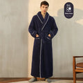 A man and woman wearing matching thickened flannel couple's bathrobes in a winter colour.