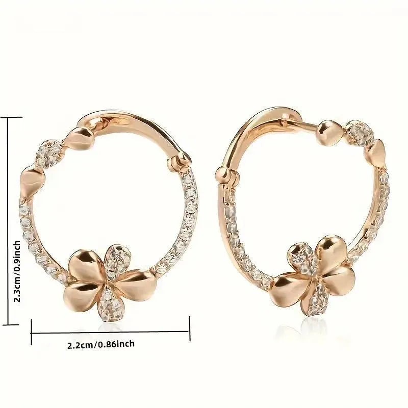 Women's round ring earrings in electroplated copper with geometric design