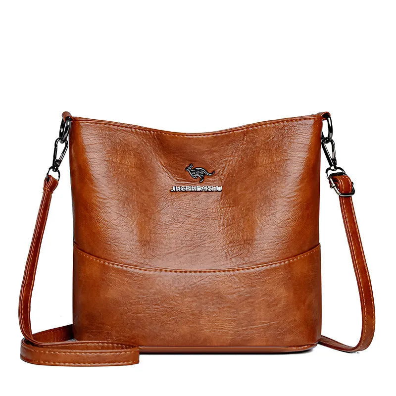Women's large capacity soft leather shoulder bag in bucket style with sandwich pocket