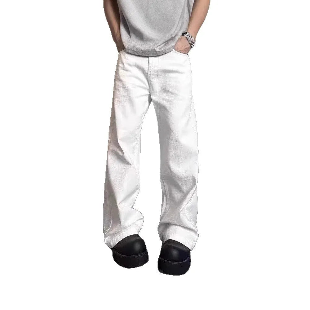 Men's white loose straight-leg cotton denim jeans with wide cut and zipper fly