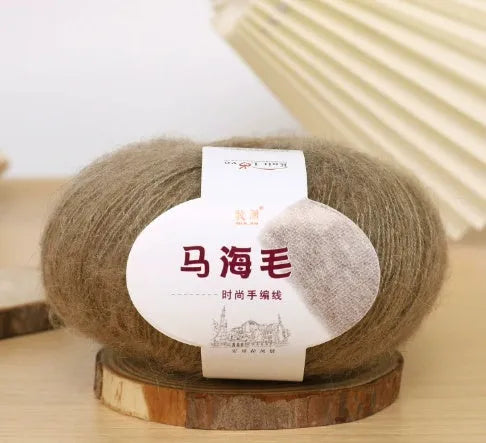 Mohair wool ball for DIY scarf knitting in assorted colours on white background