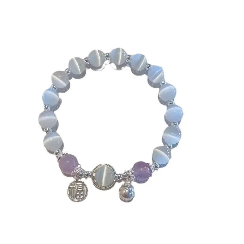 Handcrafted glass butterfly bracelet with drop-shaped moonlight grey beads and special-interest design