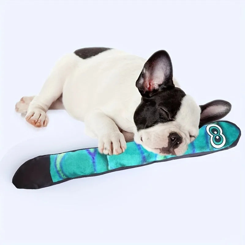 Rainbow stripe snake-shaped plush dog squeaky toy on a white background
