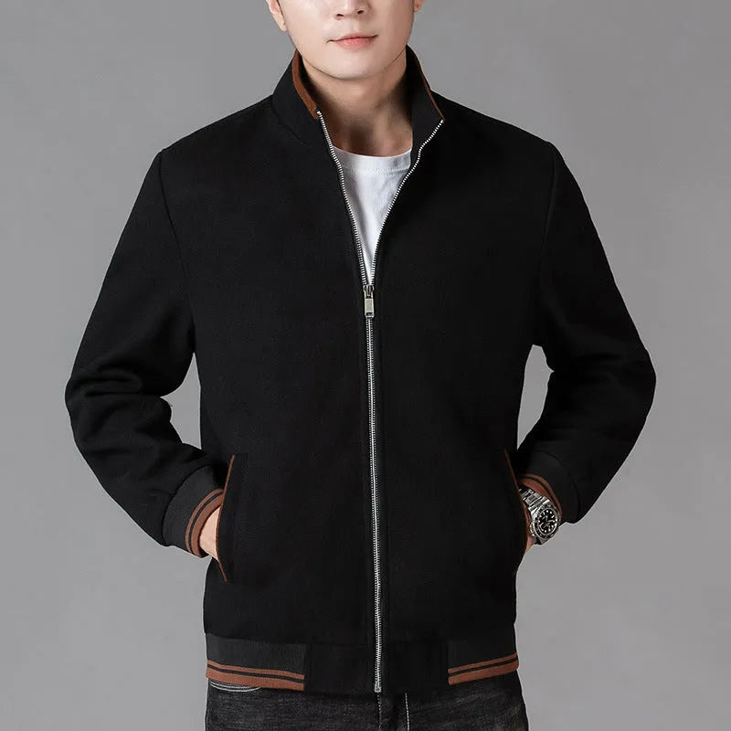 Men's grey polyester fleece jacket with long sleeves and a stick pocket, shown on a hanger.