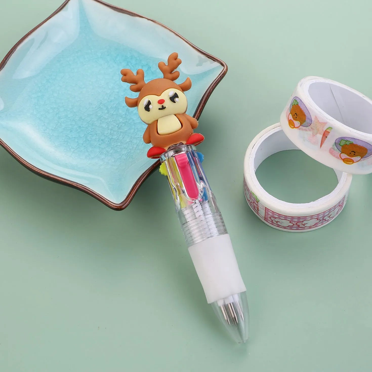 Compact 11cm Christmas four-colour ballpoint pen with press mechanism in festive designs