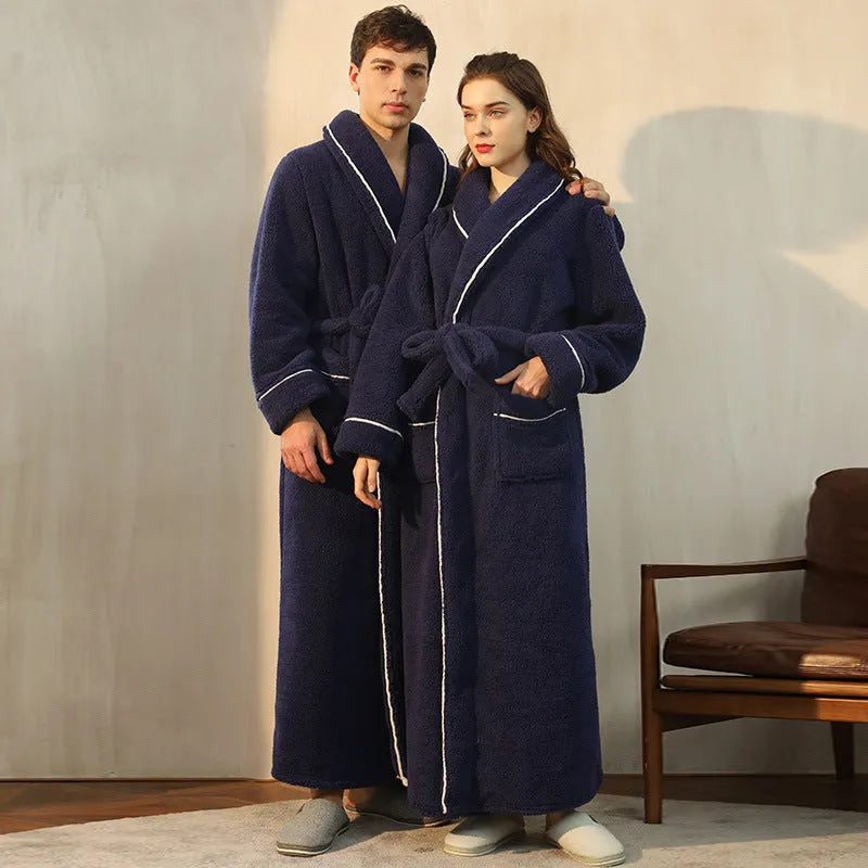 A man and woman wearing matching thickened flannel couple's bathrobes in a winter colour.