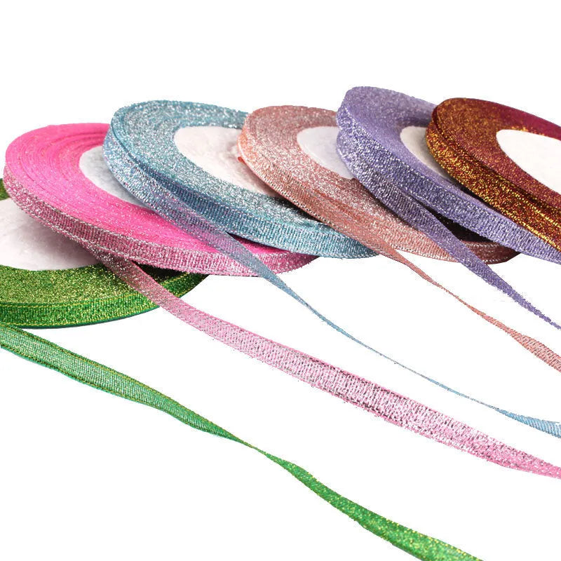 Roll of 0.6cm wide coloured polyester gift ribbon with 22 metre length.