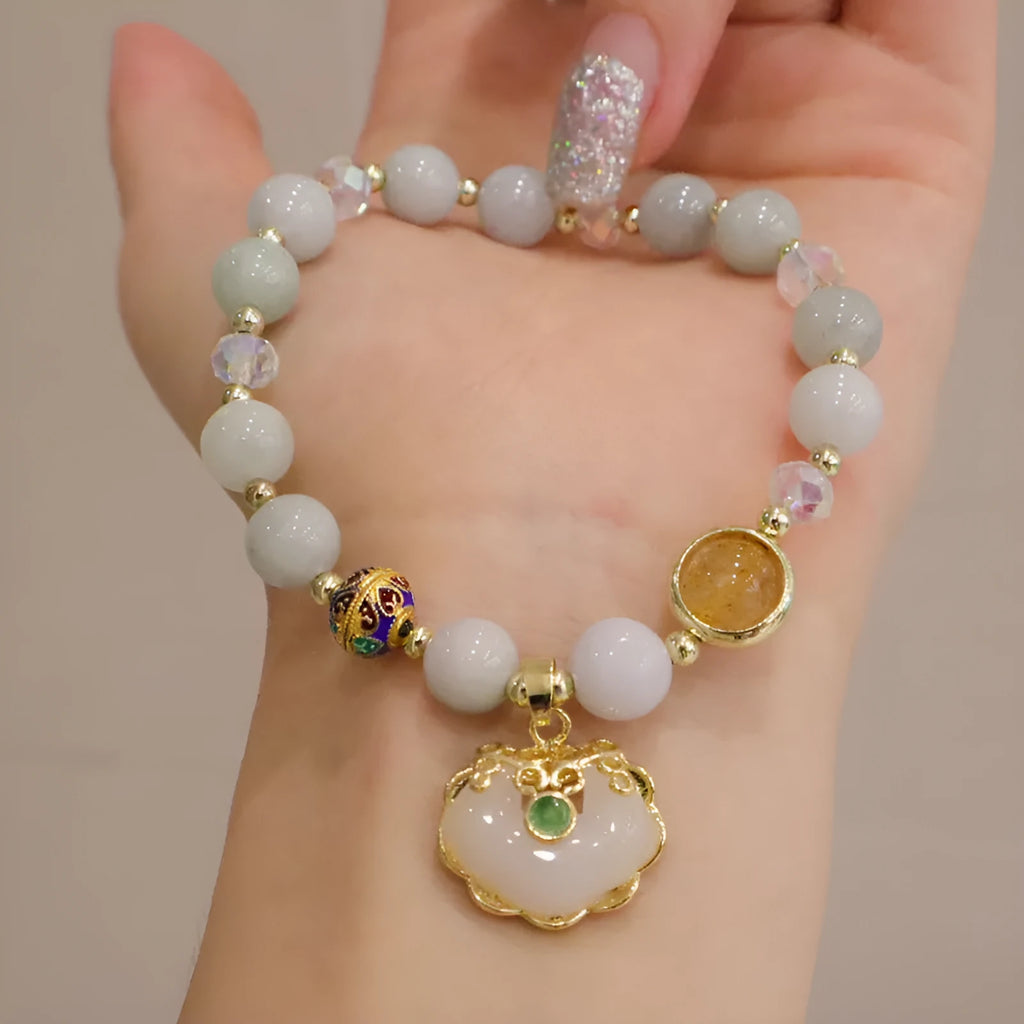 Geometric women's bracelet in gray Jade or Strawberry Quartz with three-dimensional ethnic metal decorations