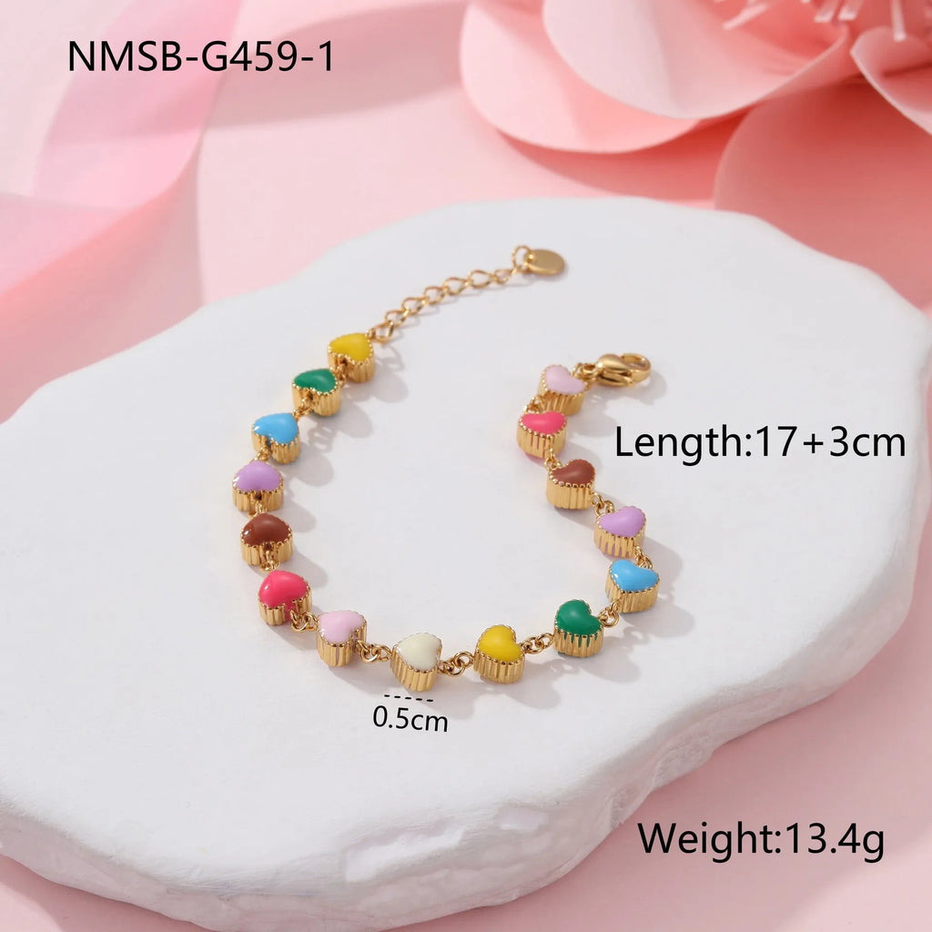 Gold or steel coloured heart-shaped titanium steel bracelet with electroplated finish for women's fashion wear