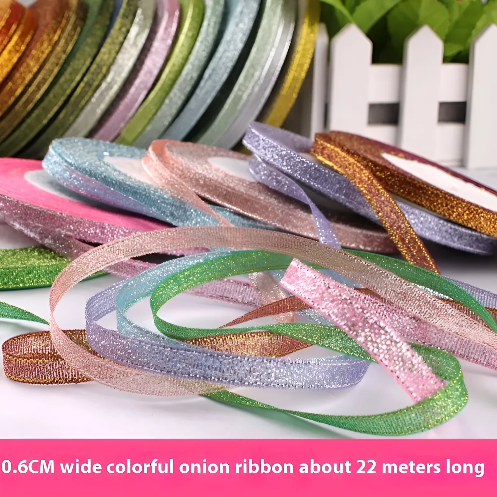 Roll of 0.6cm wide coloured polyester gift ribbon with 22 metre length.