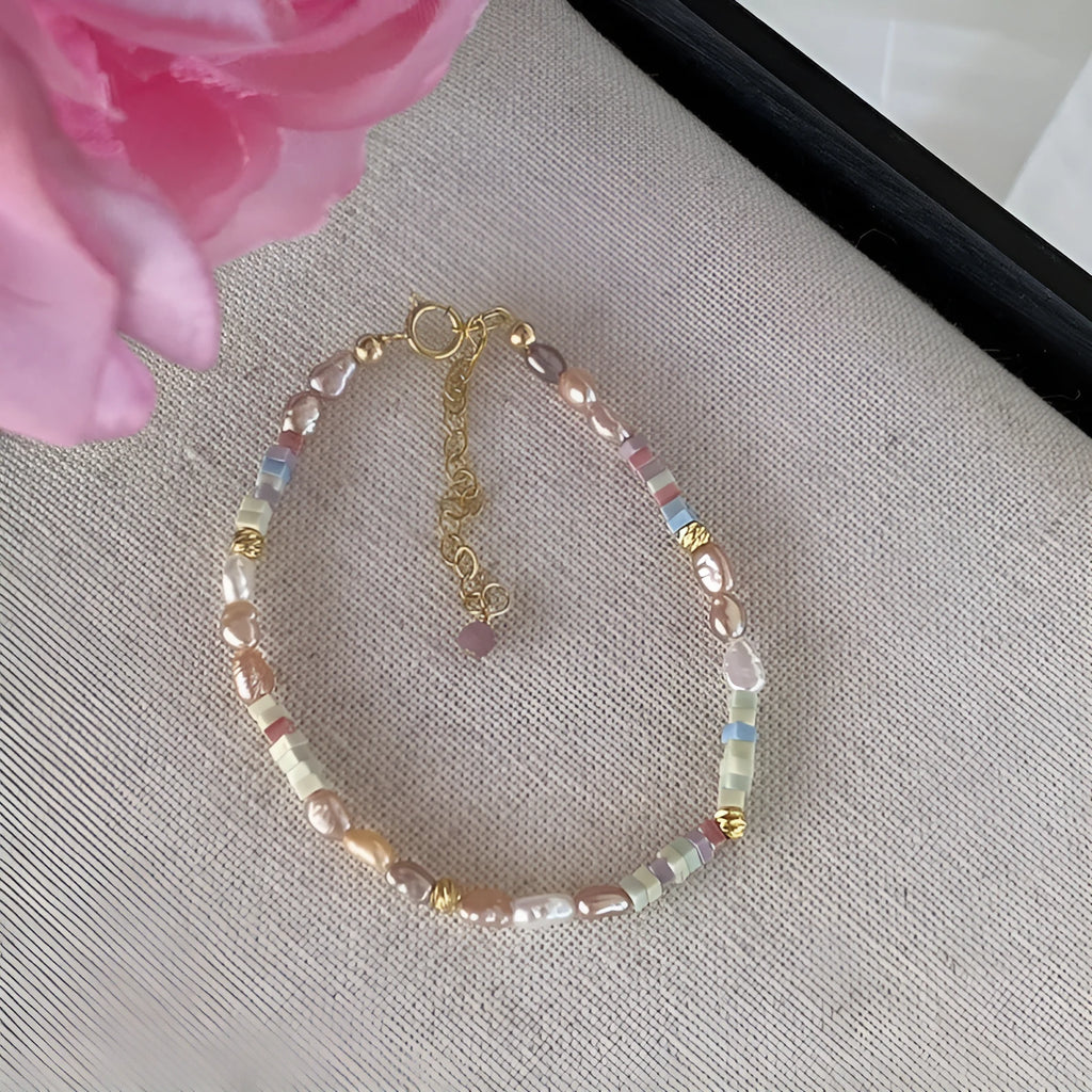 Purple freshwater pearl bracelet and necklace set with 14K gold-plated accents and irregular pearl shapes