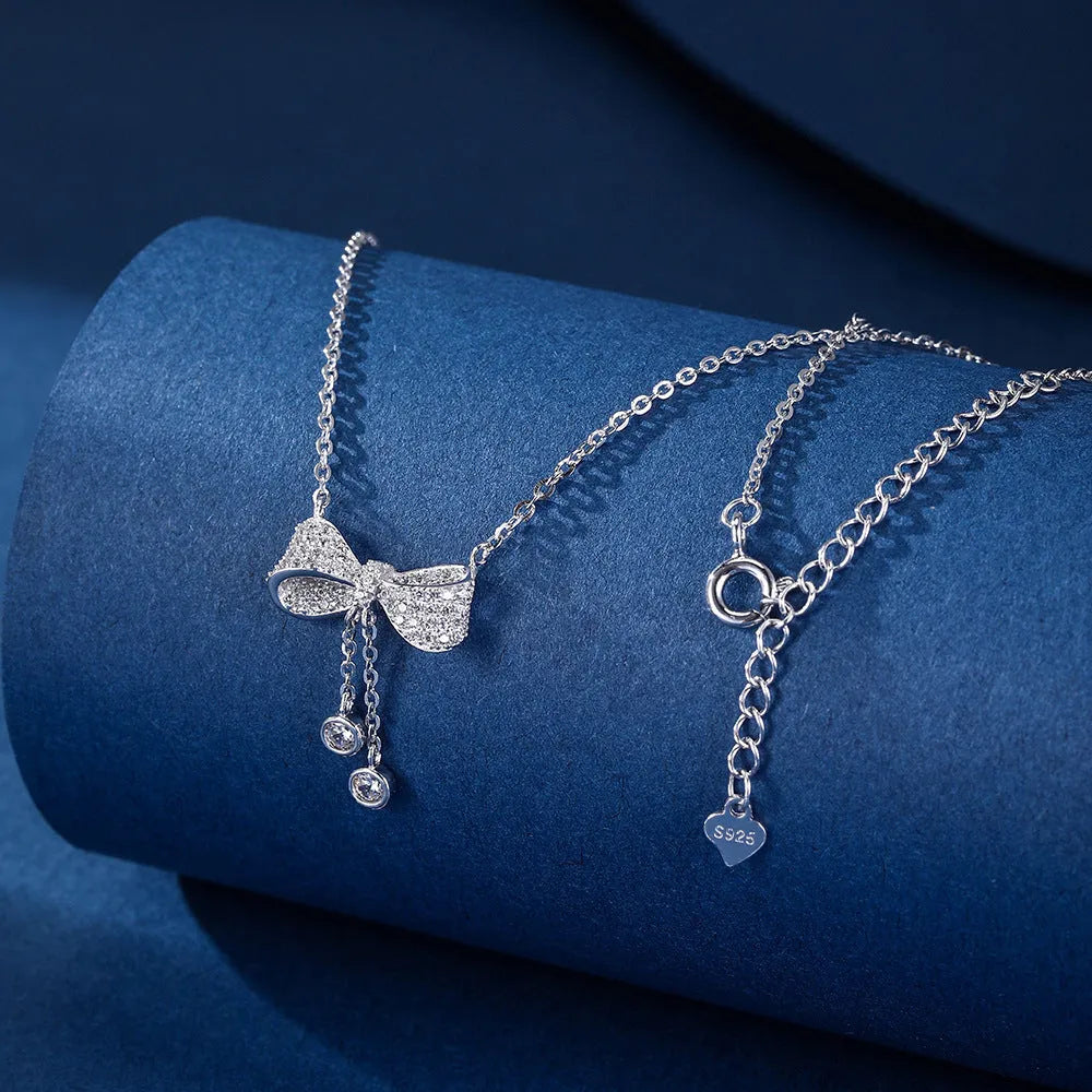 S925 sterling silver bow pendant necklace on woman with adjustable 40-45cm clavicle chain