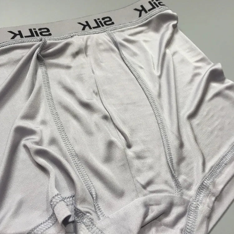 Men's silk shorts in navy blue with mid waist design and loose fit