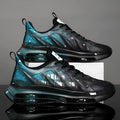 Men's black and green platform running shoes with mesh upper and rubber sole on a white background.