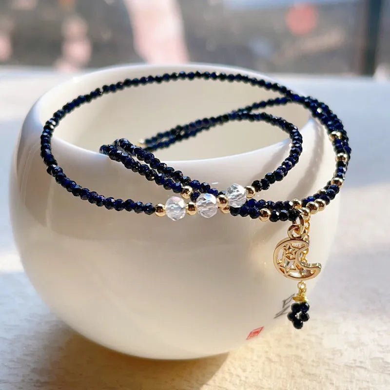 Handmade blue three-ring multi-layer bracelet for women on a wrist.