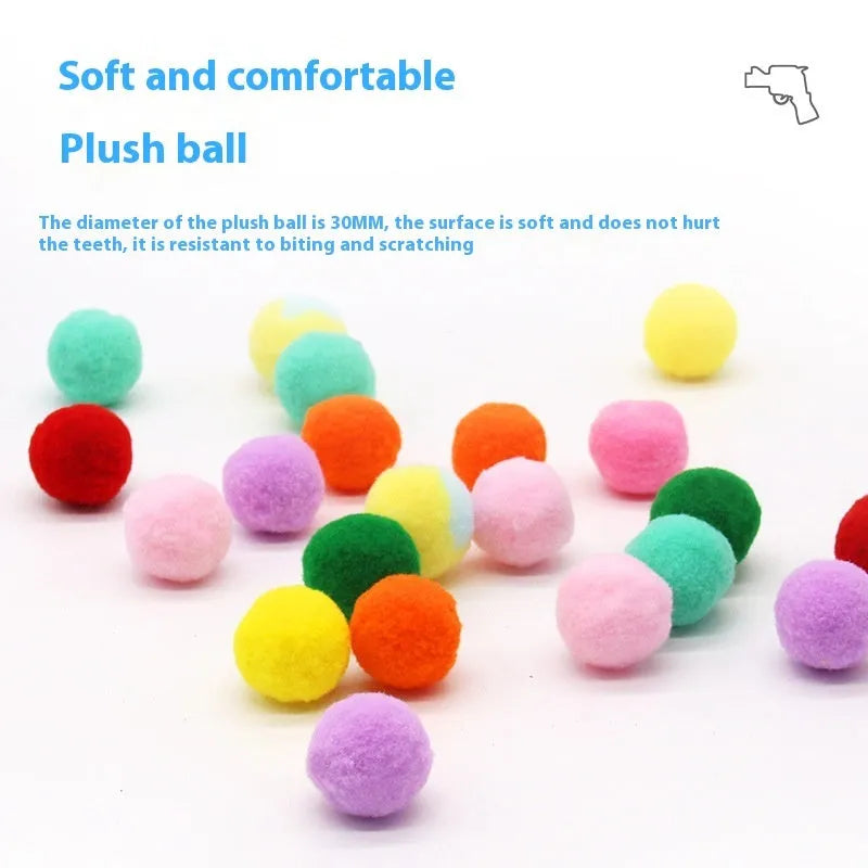 Plush cat toy launch gun with soft yarn balls for interactive indoor pet play.